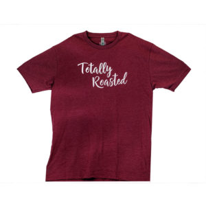 Wine red t-shirt with the words "Totally Roasted" in white on the front